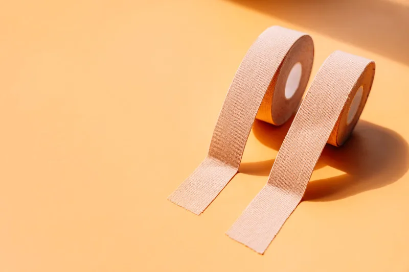 Two rolls of rigid tape rolled out