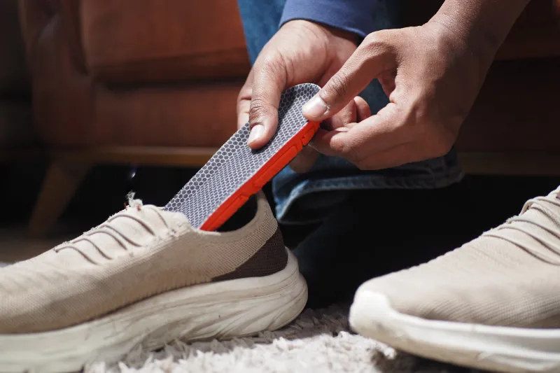 Orthopaedic insoles placed inside running shoes